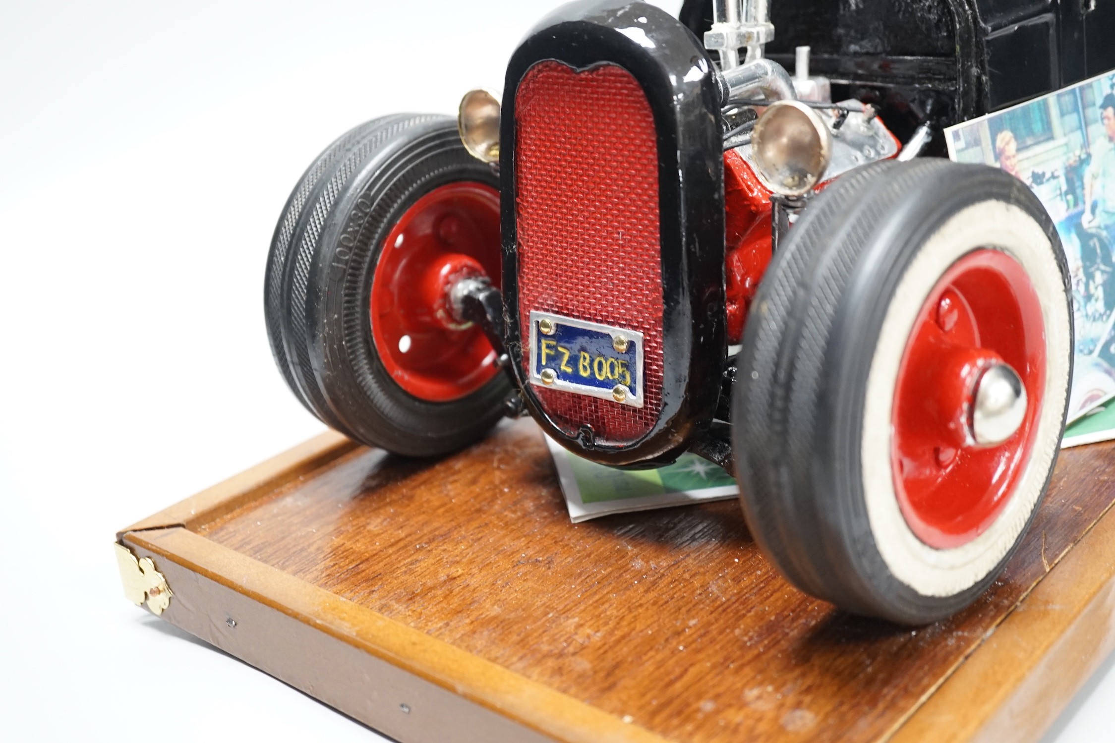 A scratch built model of Elvis Presley's Ford Coupe. 49cm wide